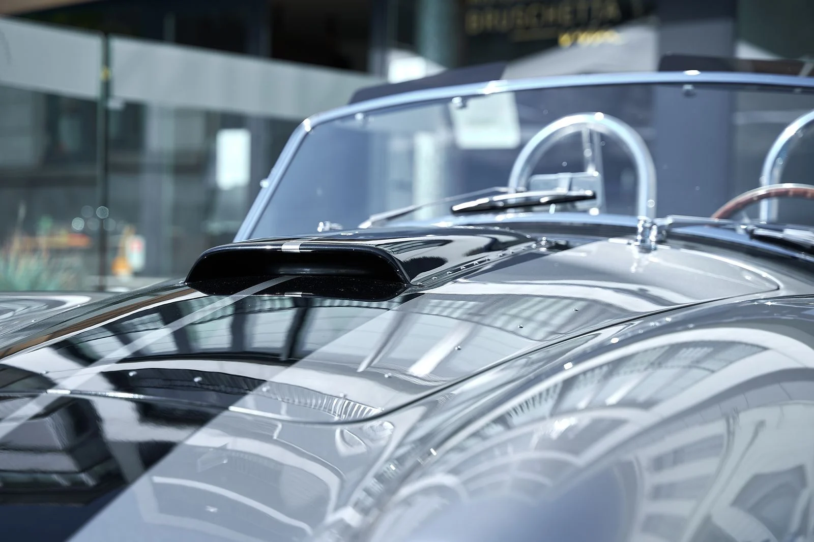 Close-up of a car hood where stone chips often appear